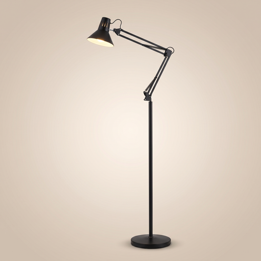 Scandinavian swivel arm standing floor lamp, lit, on a warm neutral background