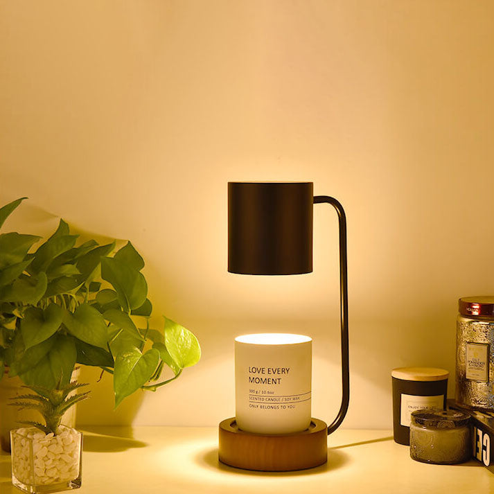 Melting wax table lamp with wooden base, detail view